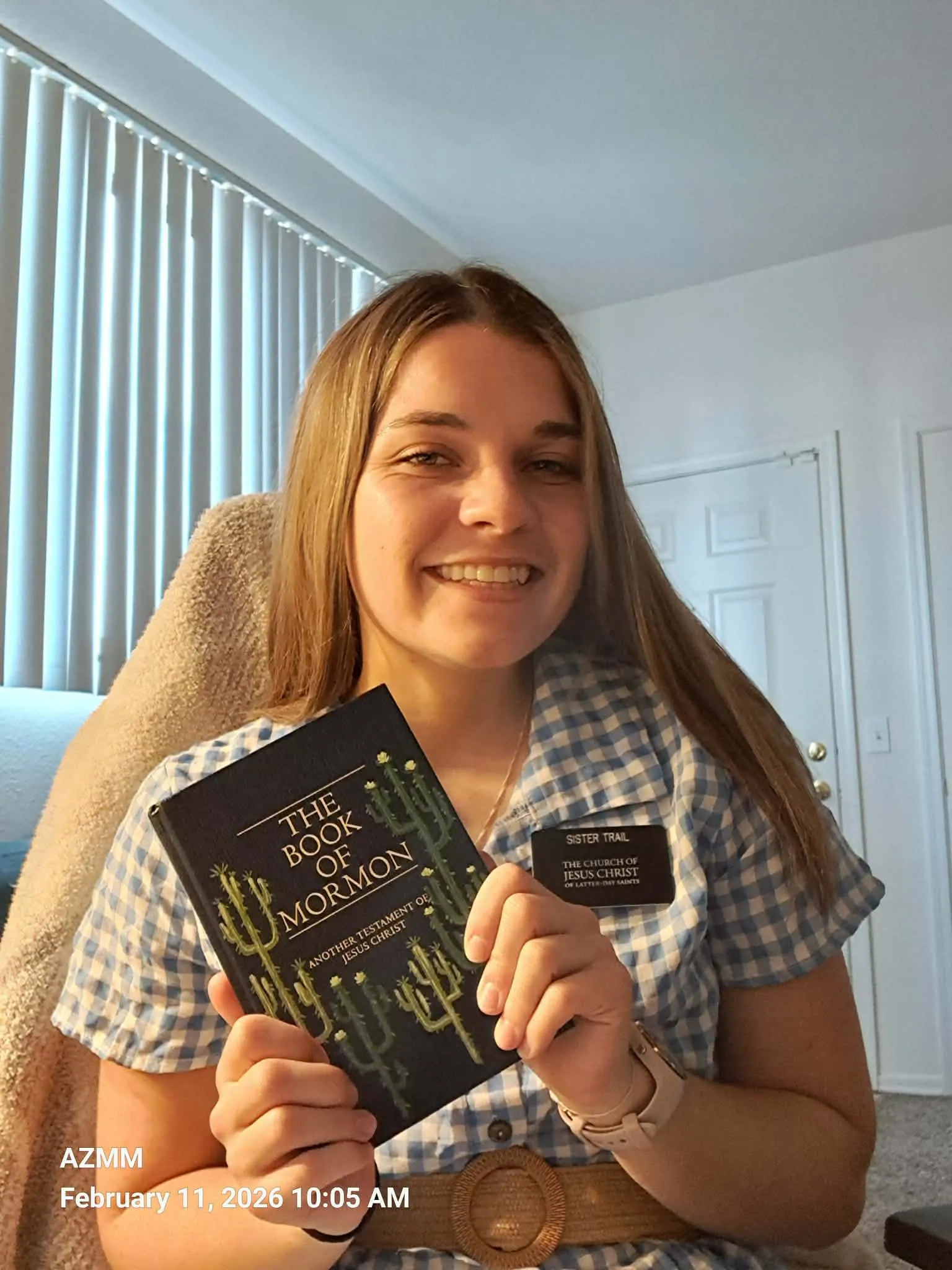 Sister Trail holding her painted Book of Mormon